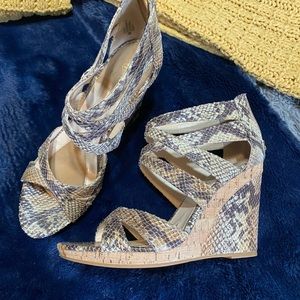 Snakeskin wedge heels